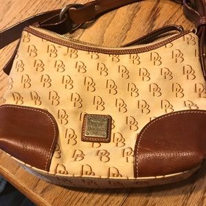 Dooney & Bourke small hand bag light brown/tan
